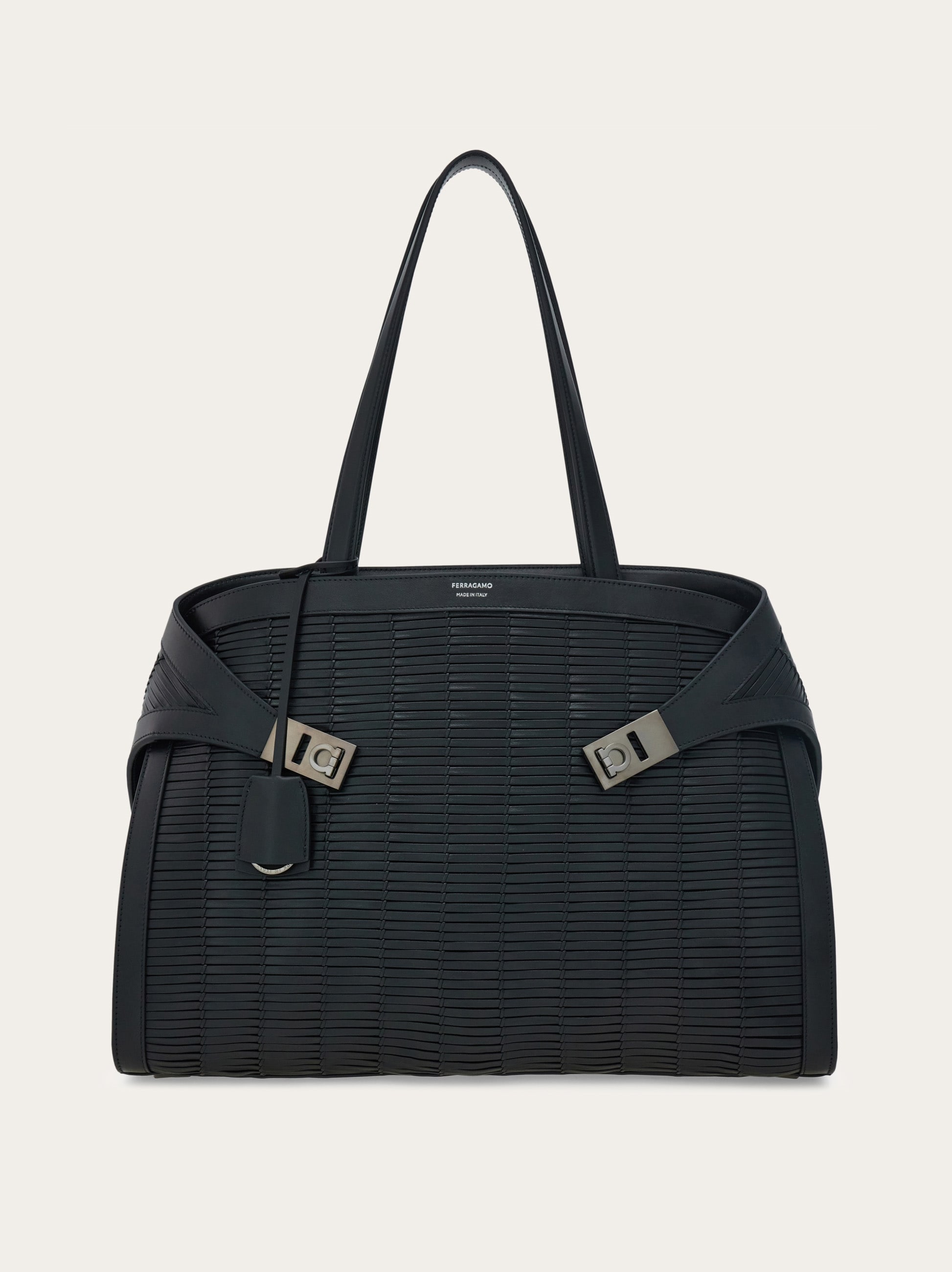ferragamo travel leather tote bag | mini nude crafted from rich calfskin with leather lining that subtly peeks from the side folds for added depth and elegance Ferragamo Women Folded tote Bag