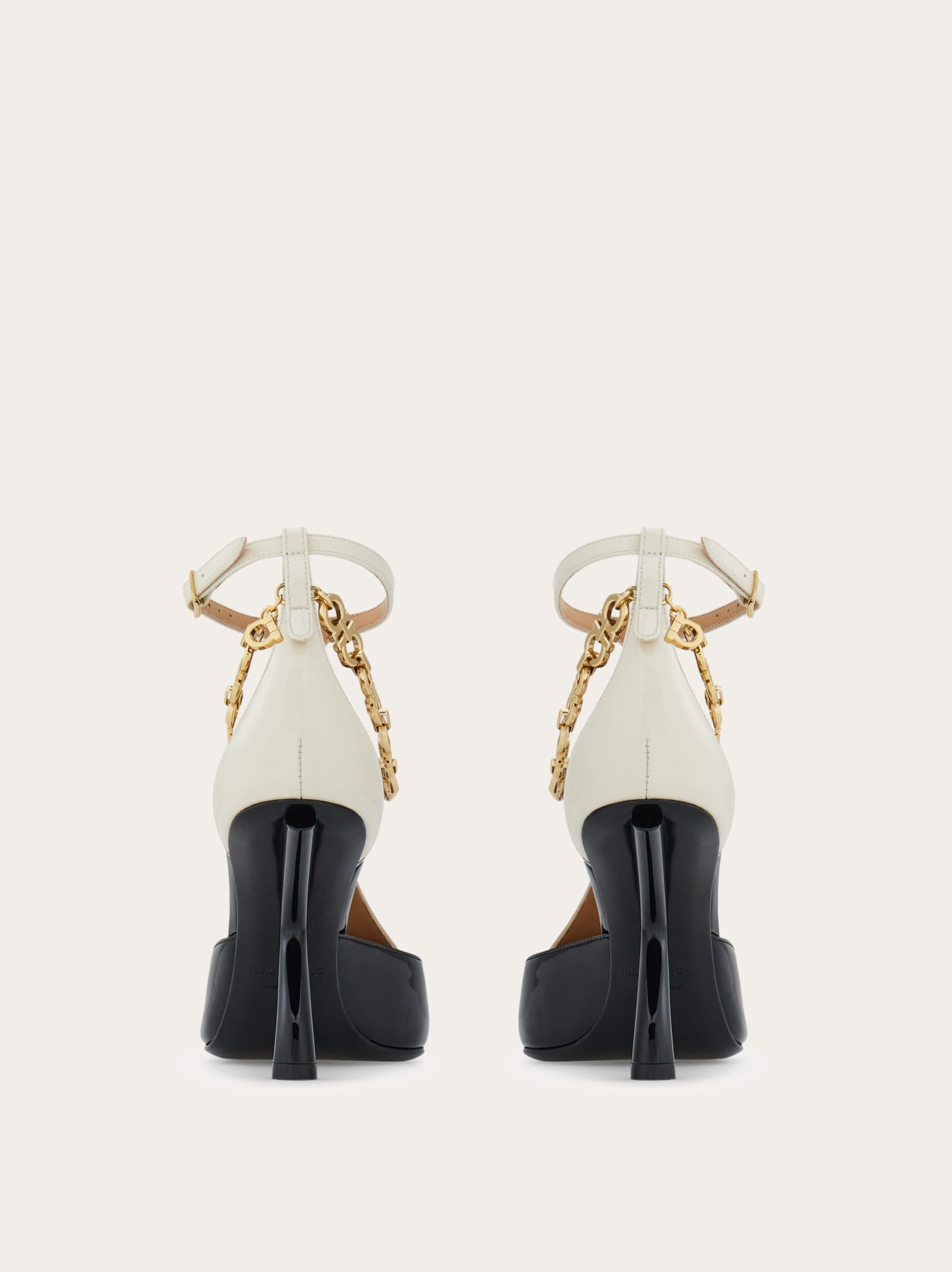 S-shaped heel pump with Gancini chain - Women | Ferragamo
