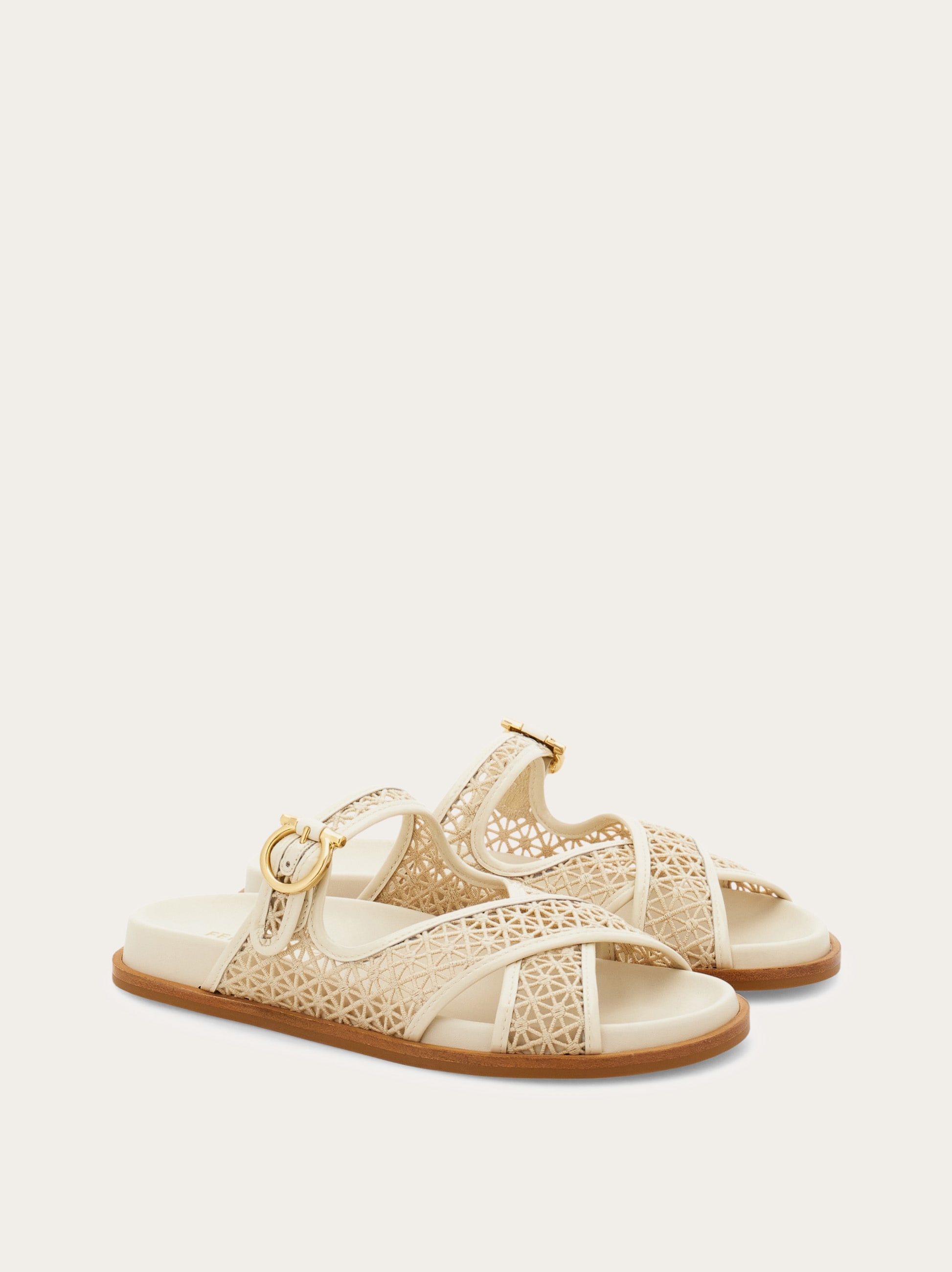 Gancini buckle crossover slide - Women | Ferragamo