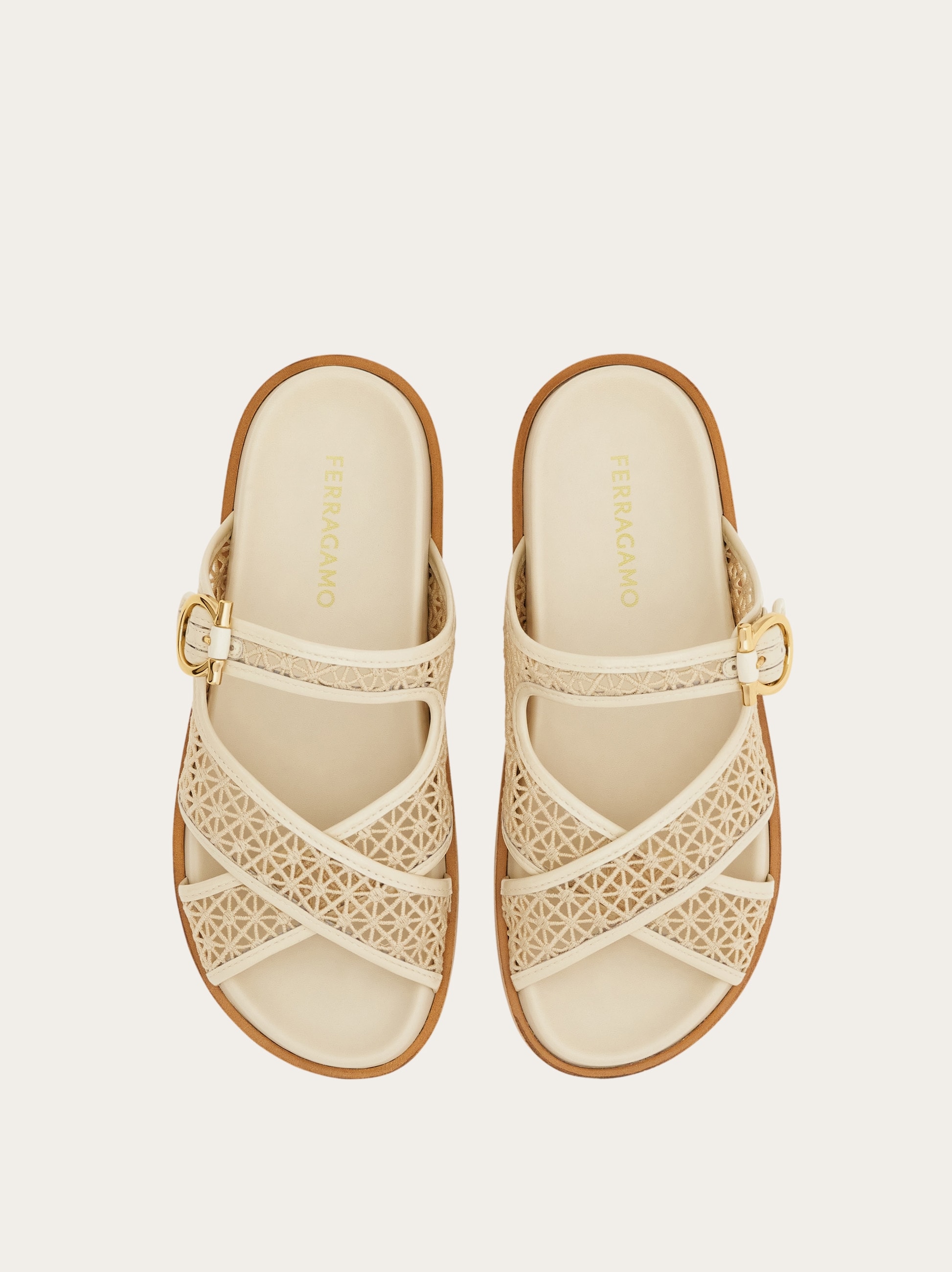 Gancini buckle crossover slide - Women | Ferragamo