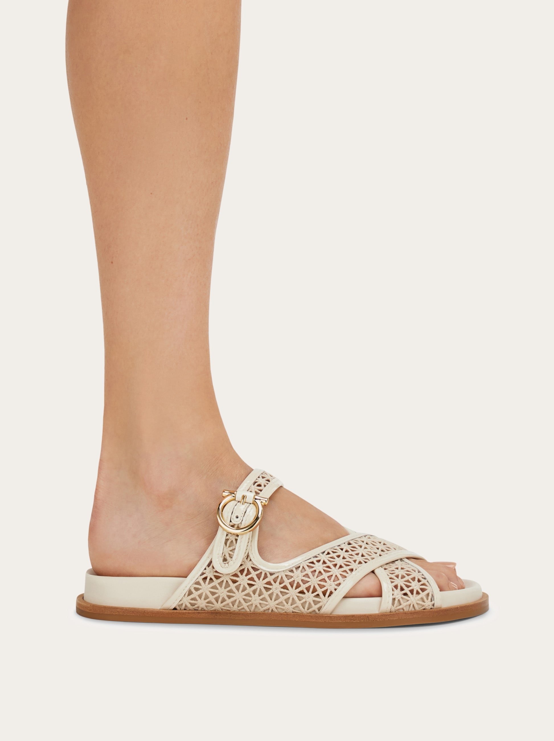 Gancini buckle crossover slide - Women | Ferragamo