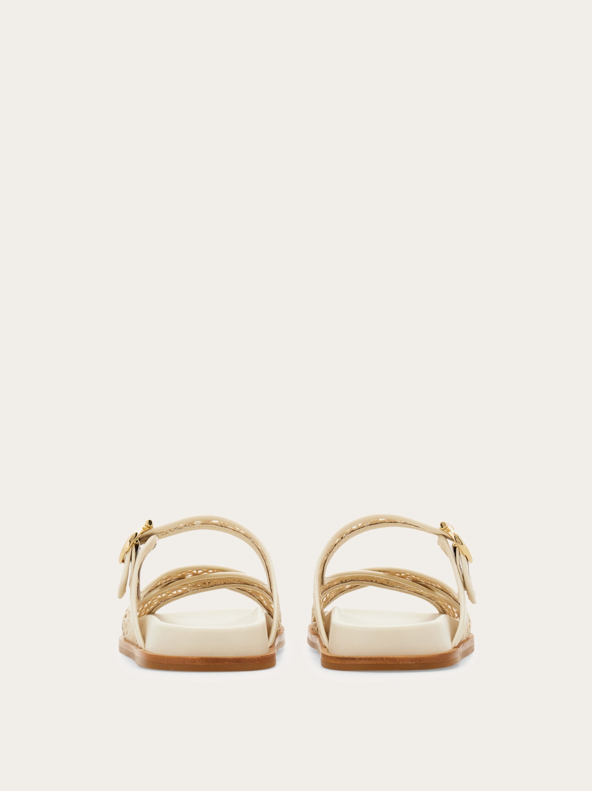 Gancini buckle crossover slide - Women | Ferragamo