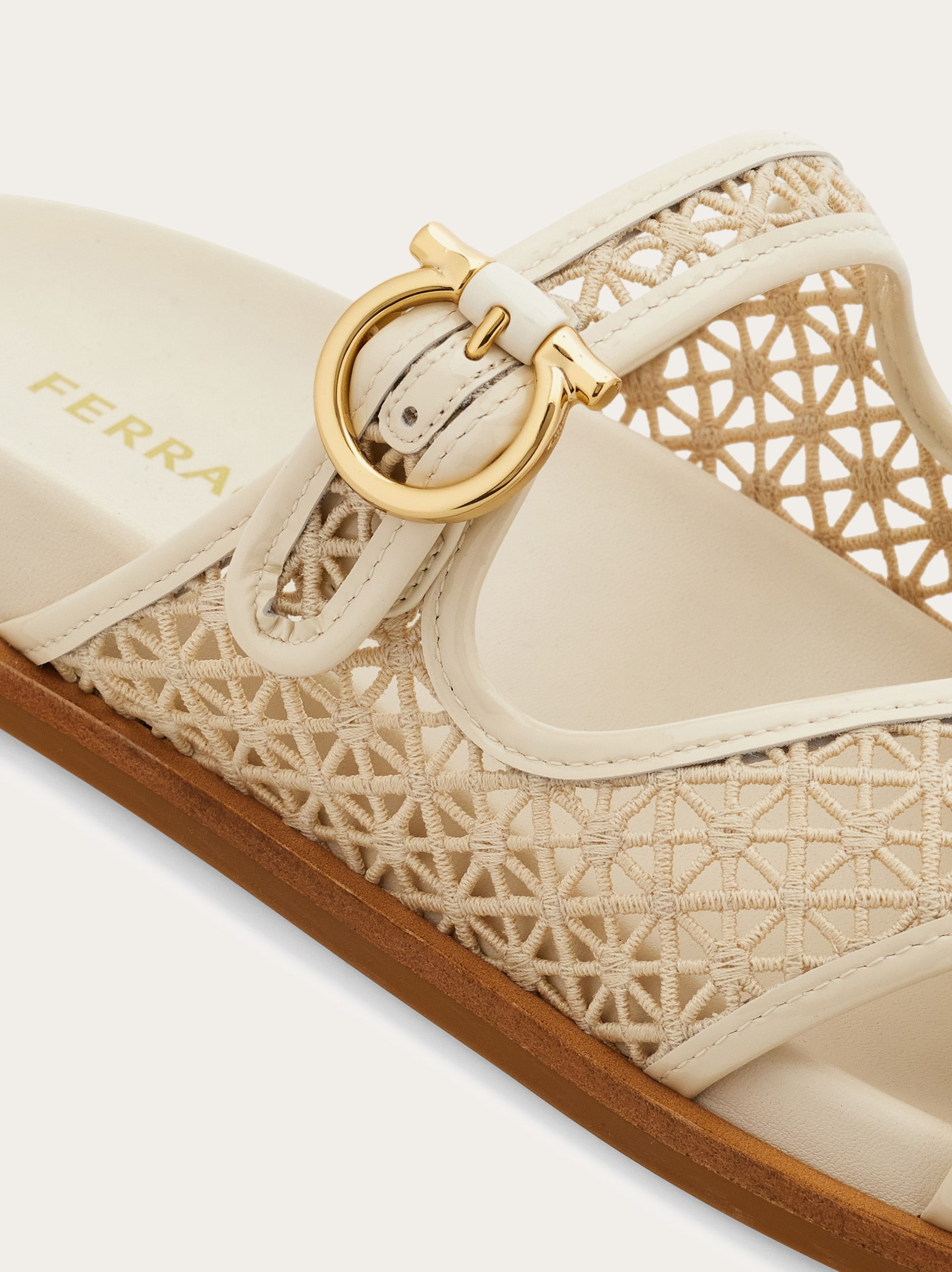 Gancini buckle crossover slide - Women | Ferragamo