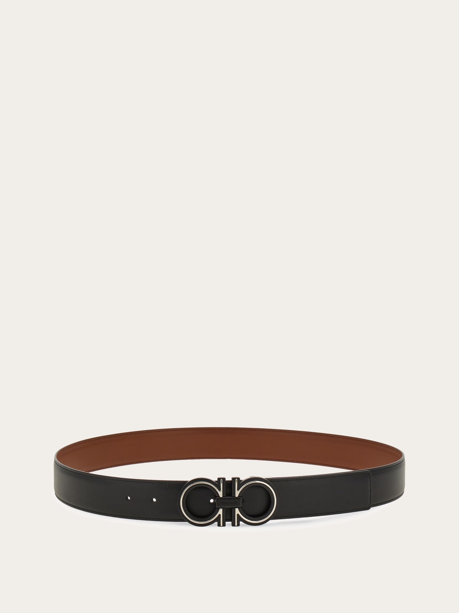 Reversible and adjustable Gancini belt - Men | Ferragamo