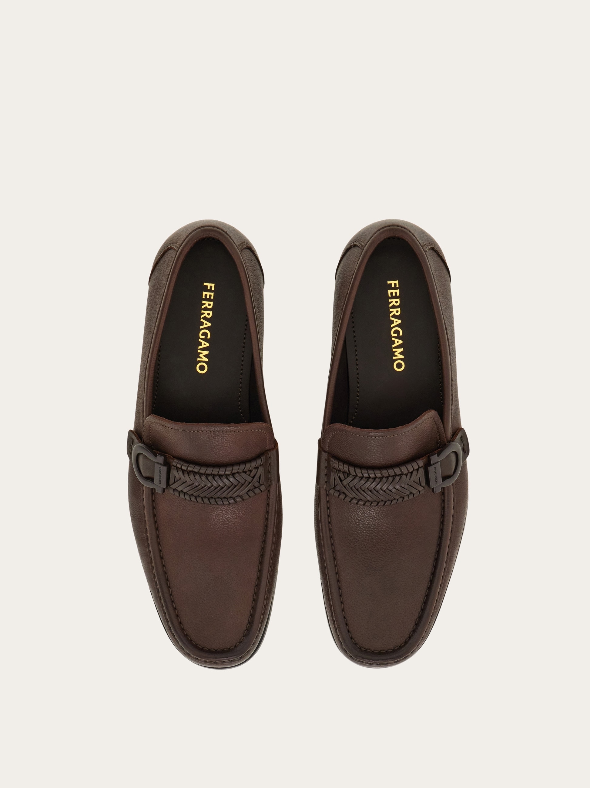 Moccasin with braid Gancini ornament - Men | Ferragamo