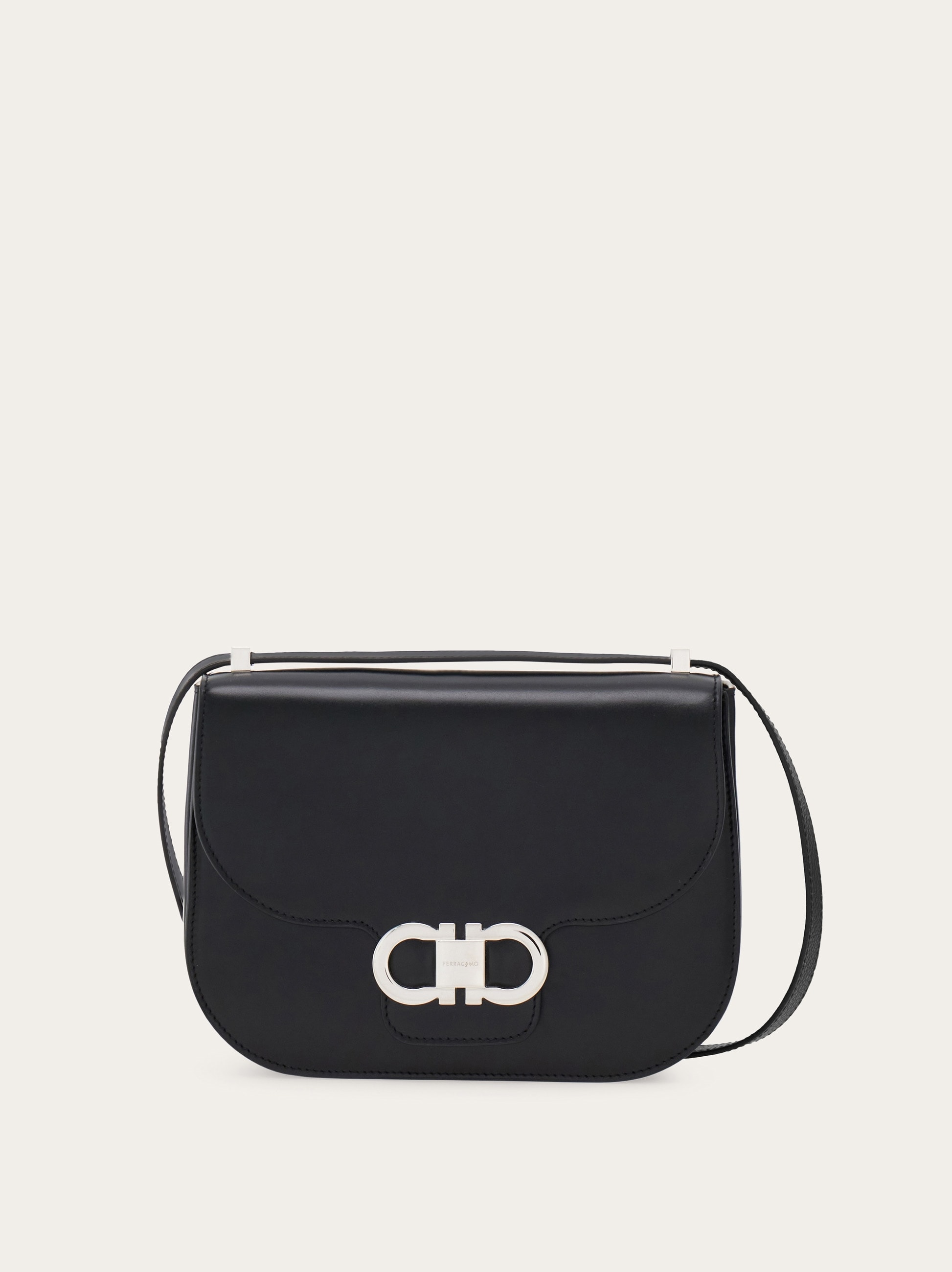 Double Gancini North-South crossbody bag (XS) - Women | Ferragamo