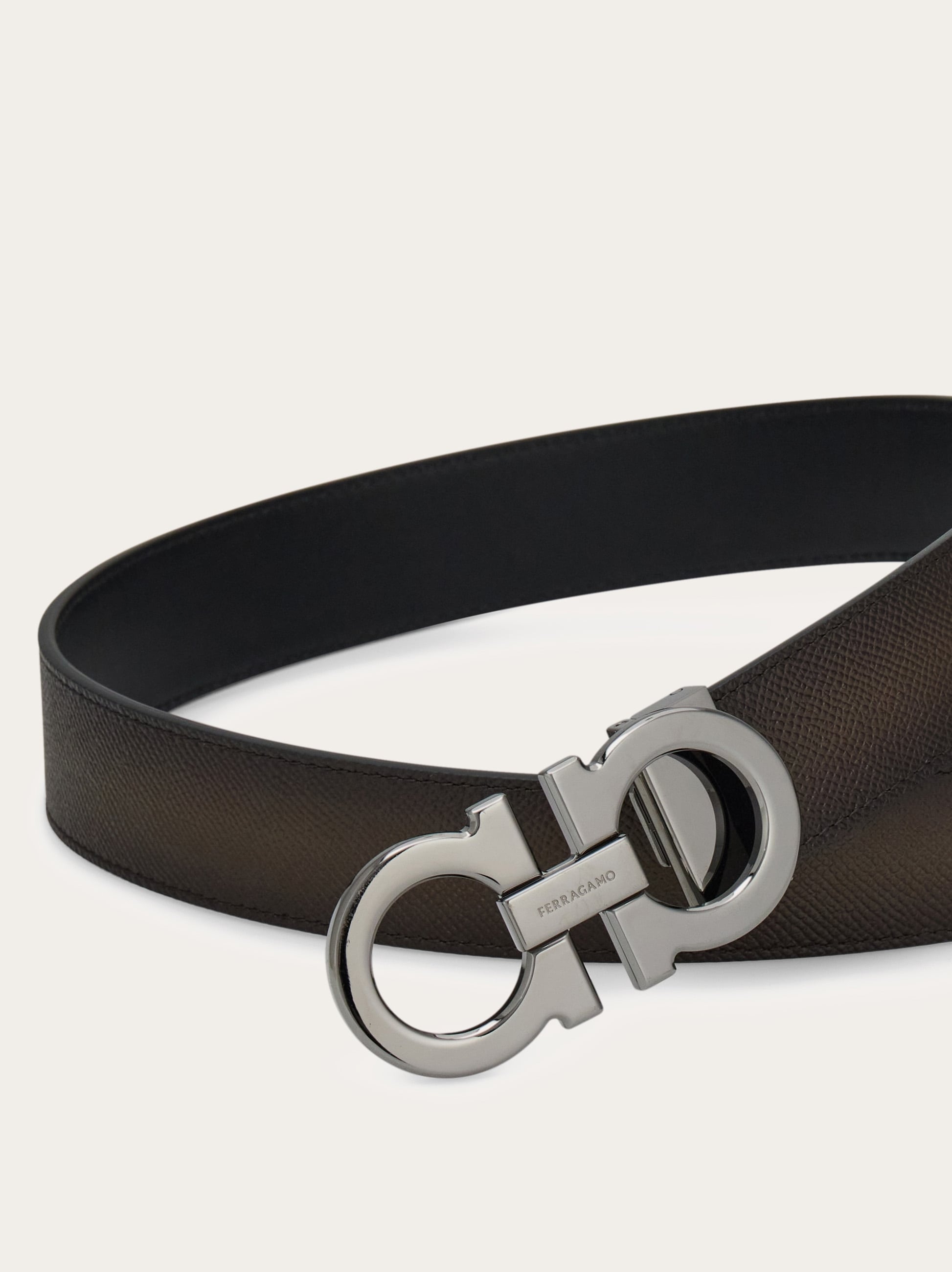 Reversible and adjustable Gancini belt - Men | Ferragamo