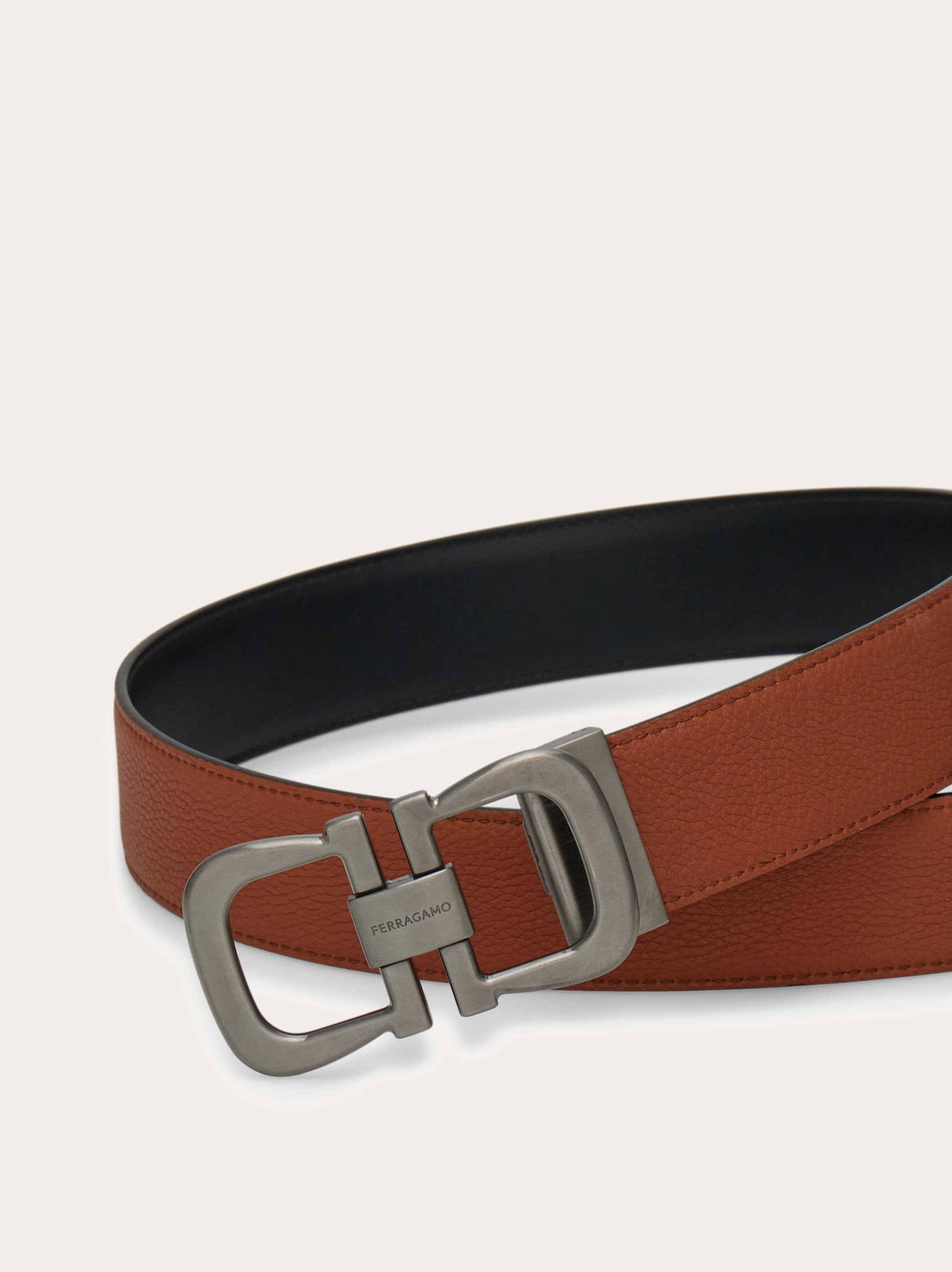 Reversible and adjustable Gancini belt - Men | Ferragamo