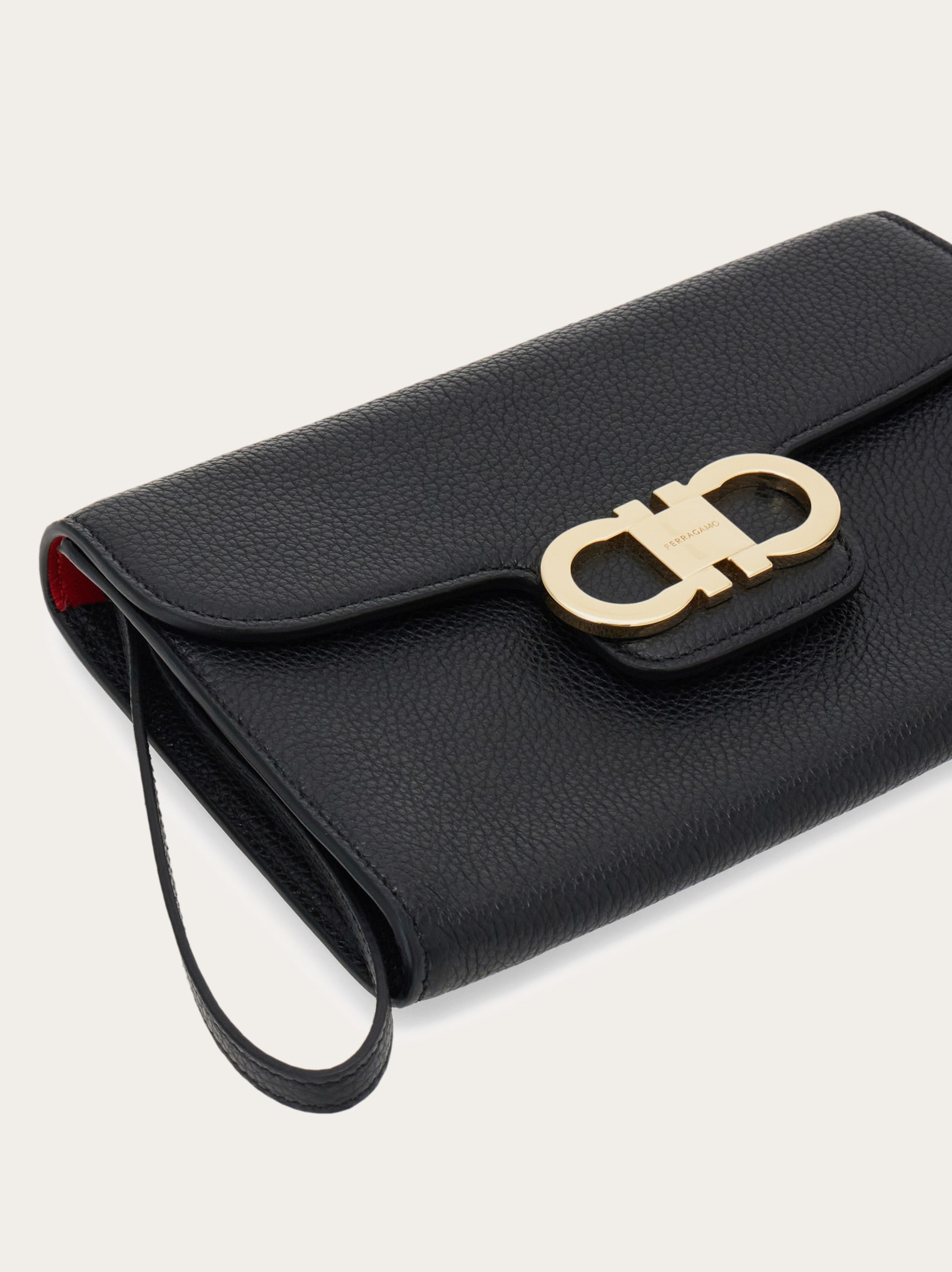 Double Gancini clutch - Women | Ferragamo