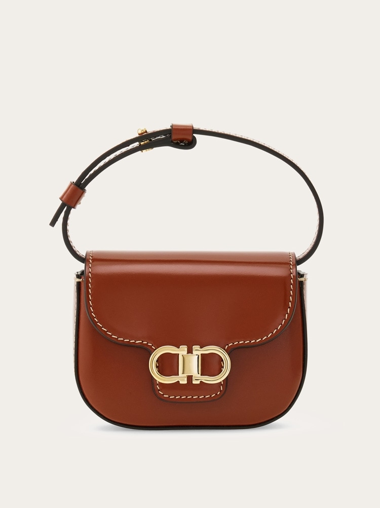 Double Gancini North-South crossbody bag (XS) Gallery image 1