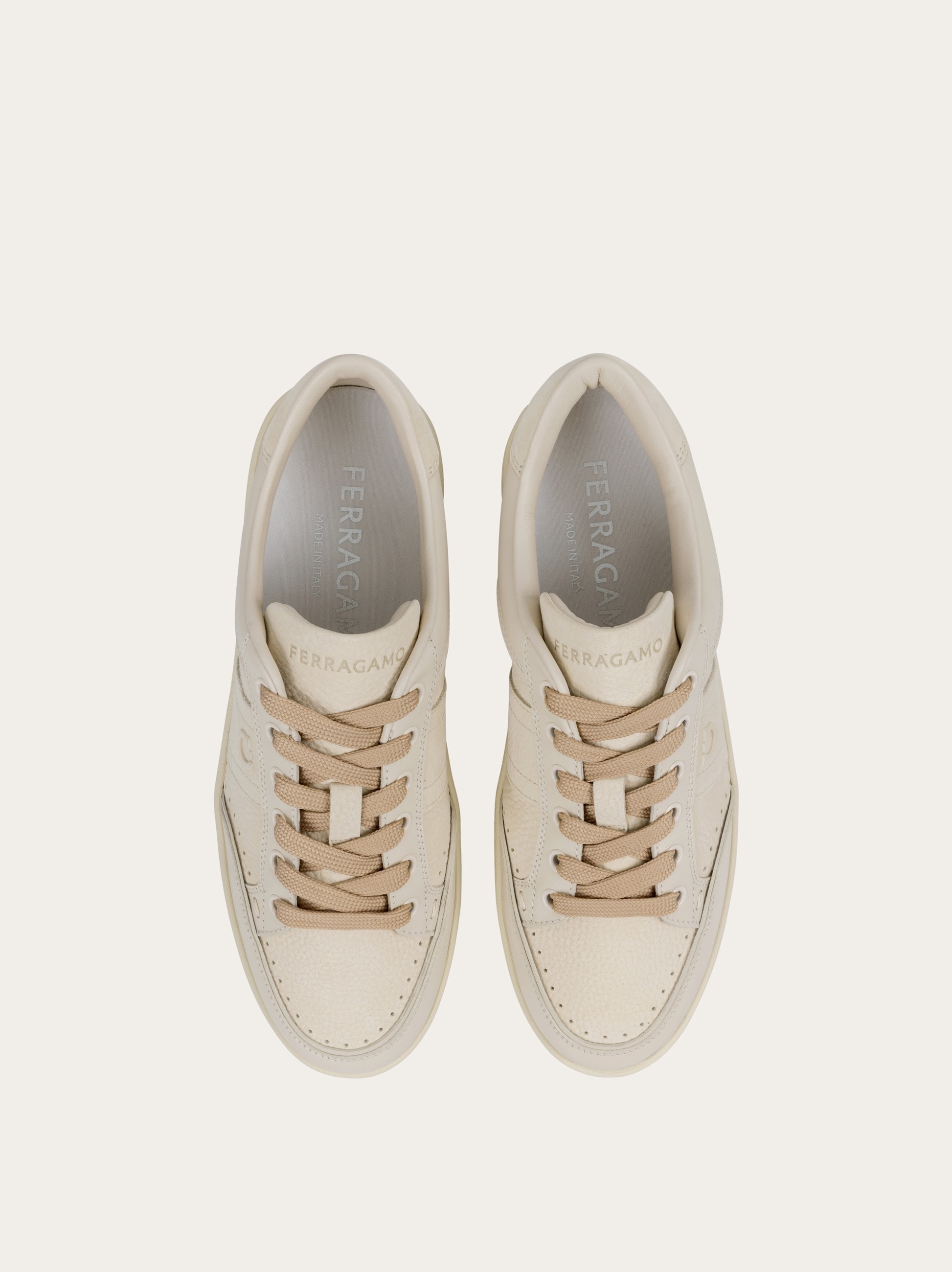 Low-top sneaker with signature - Men | Ferragamo