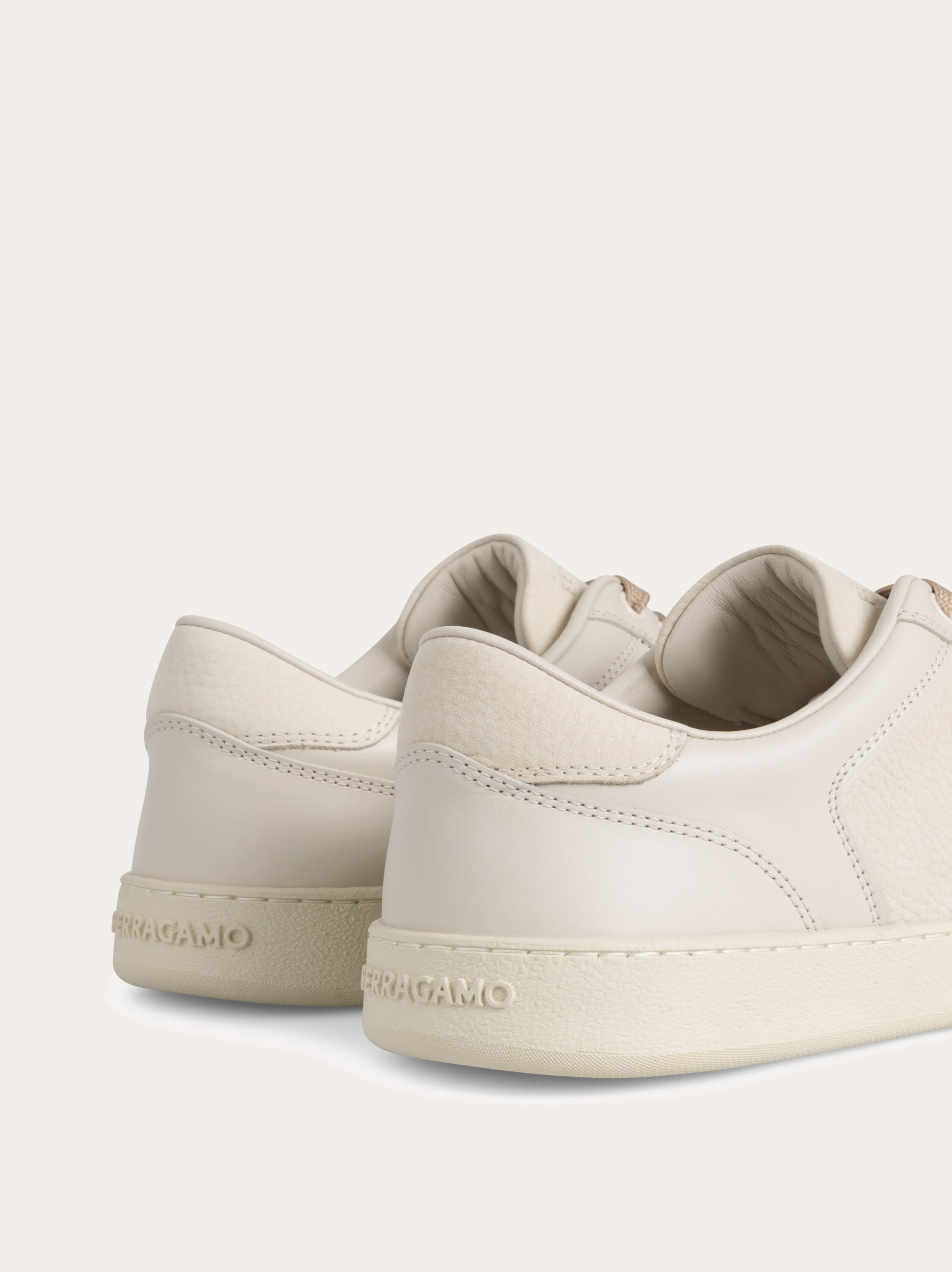 Low-top sneaker with signature - Men | Ferragamo