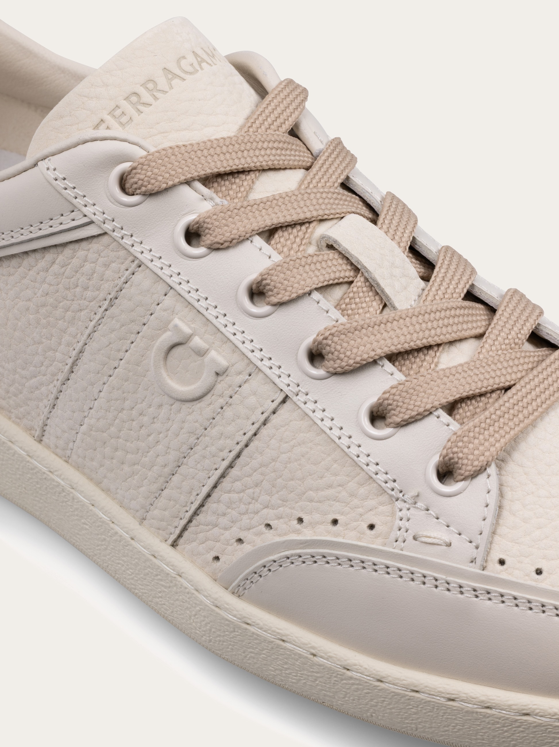 Low-top sneaker with signature - Men | Ferragamo