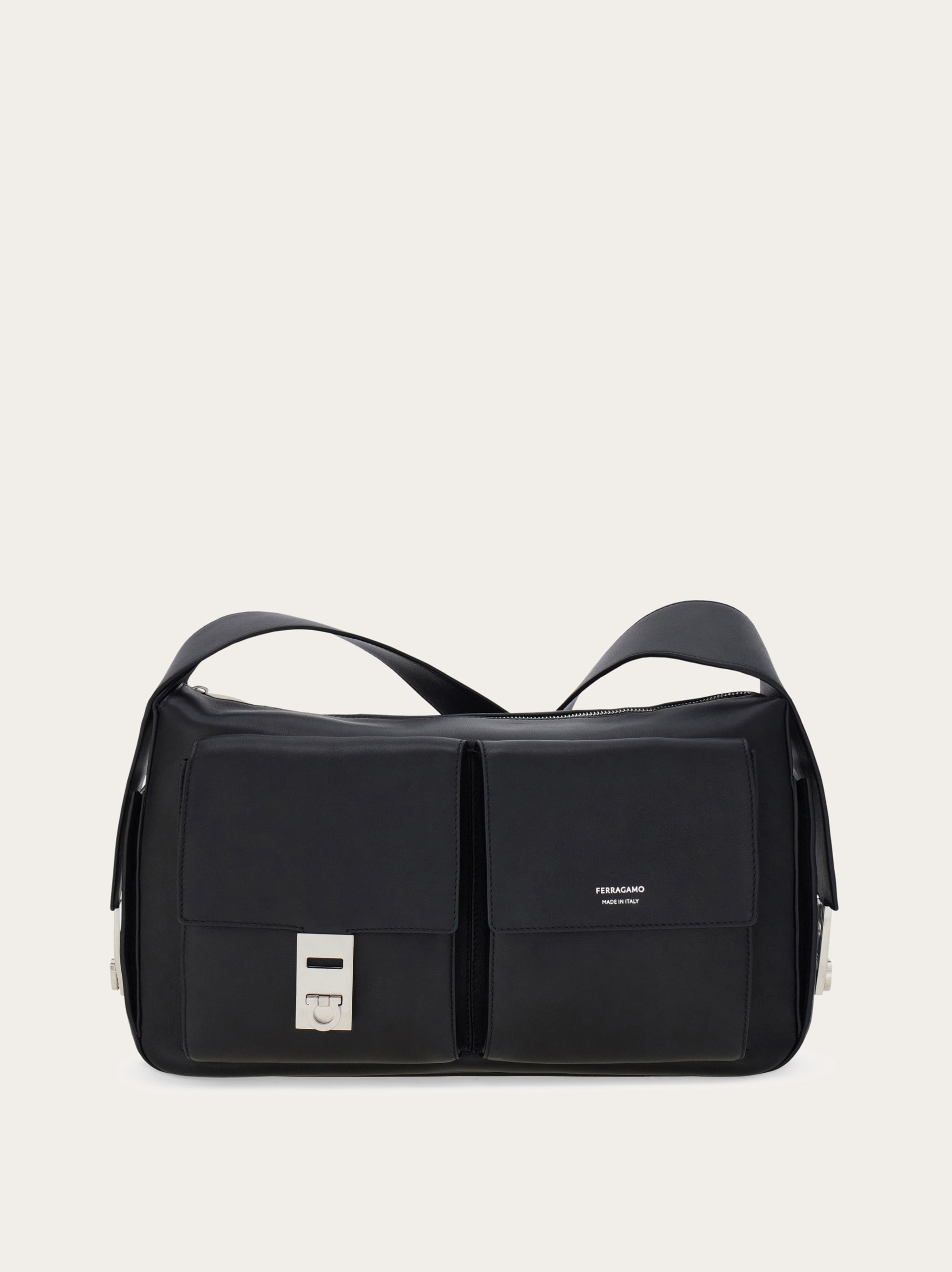 Utility shoulder bag with Hug buckle (L) - Men | Ferragamo